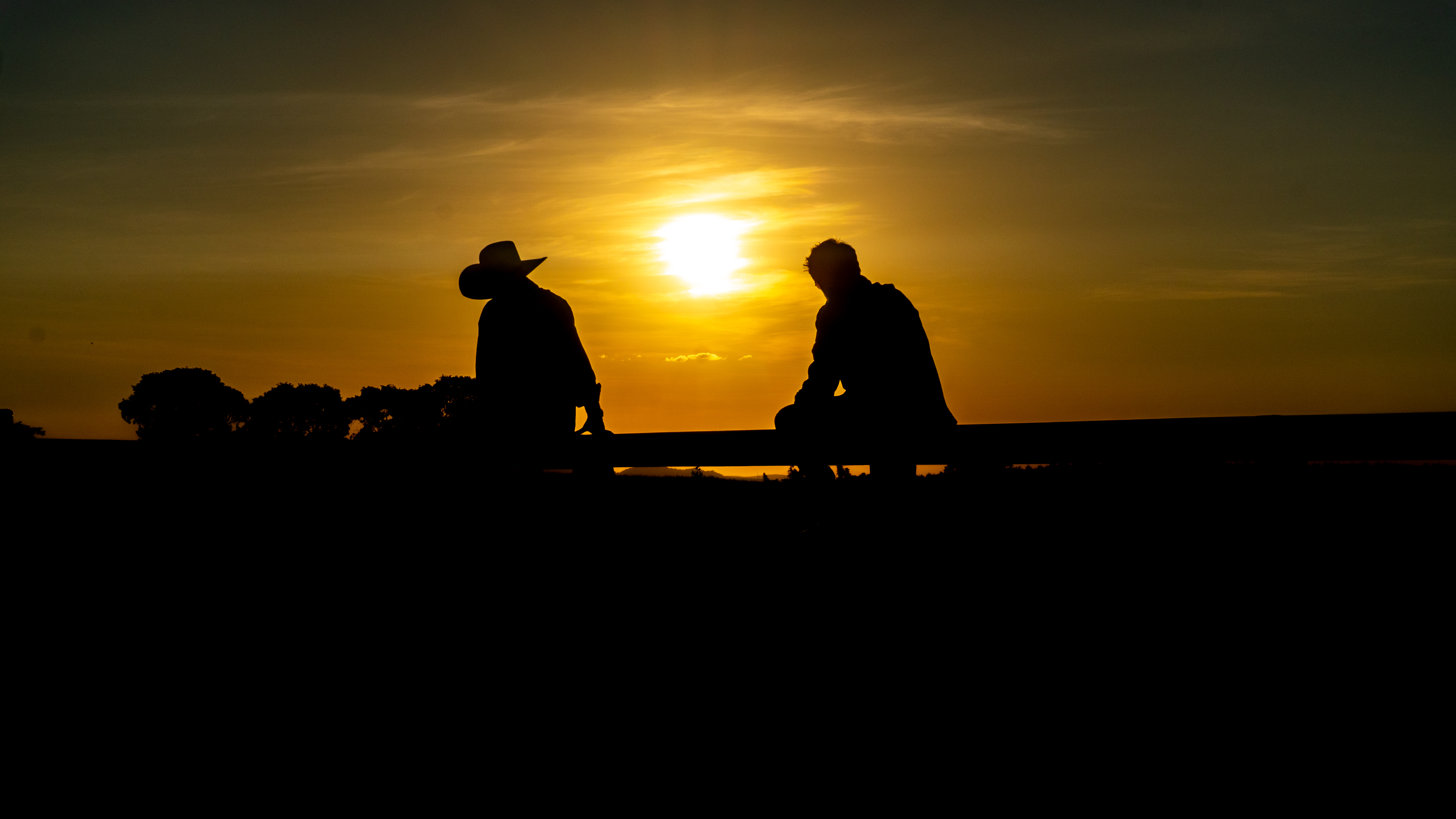 Rodrigo e Gustavo ao pôr do sol
